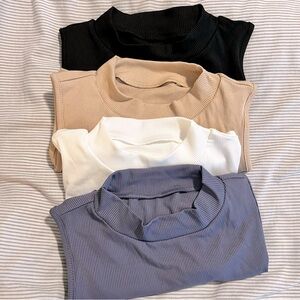 Set of 4 bodysuits, size XL